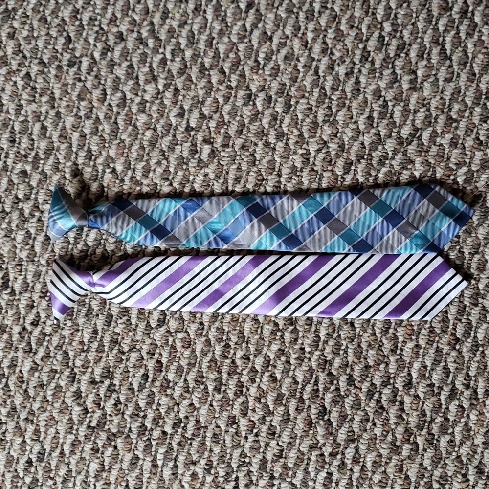 Two boys clip on ties